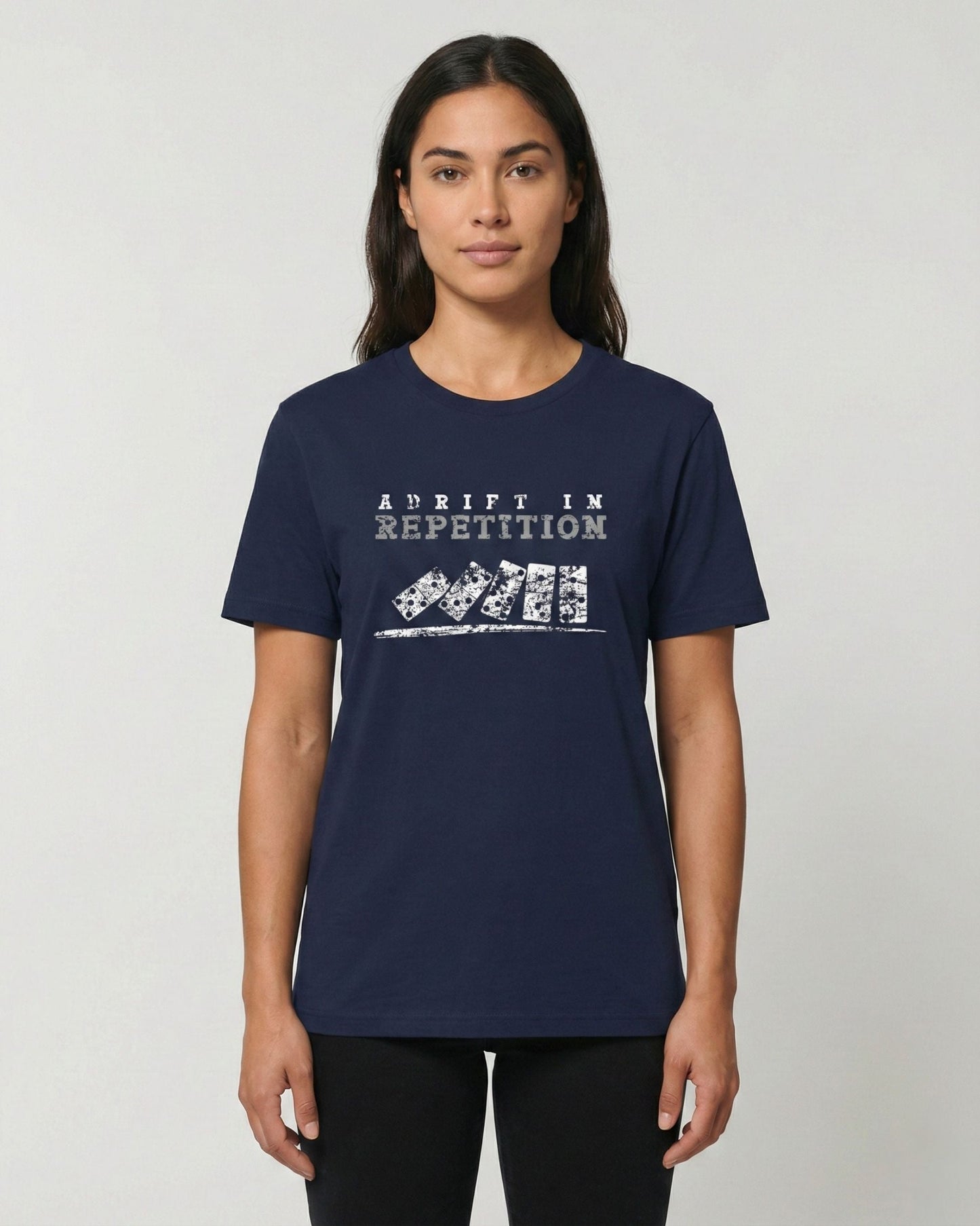 Adrift in Repetition navy t-shirt lifestyle photo woman wearing falling dominoes with skull faces design – UnseenYou