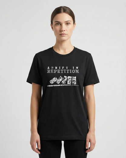 Adrift in Repetition black t-shirt lifestyle photo woman wearing falling dominoes with skull faces design – UnseenYou